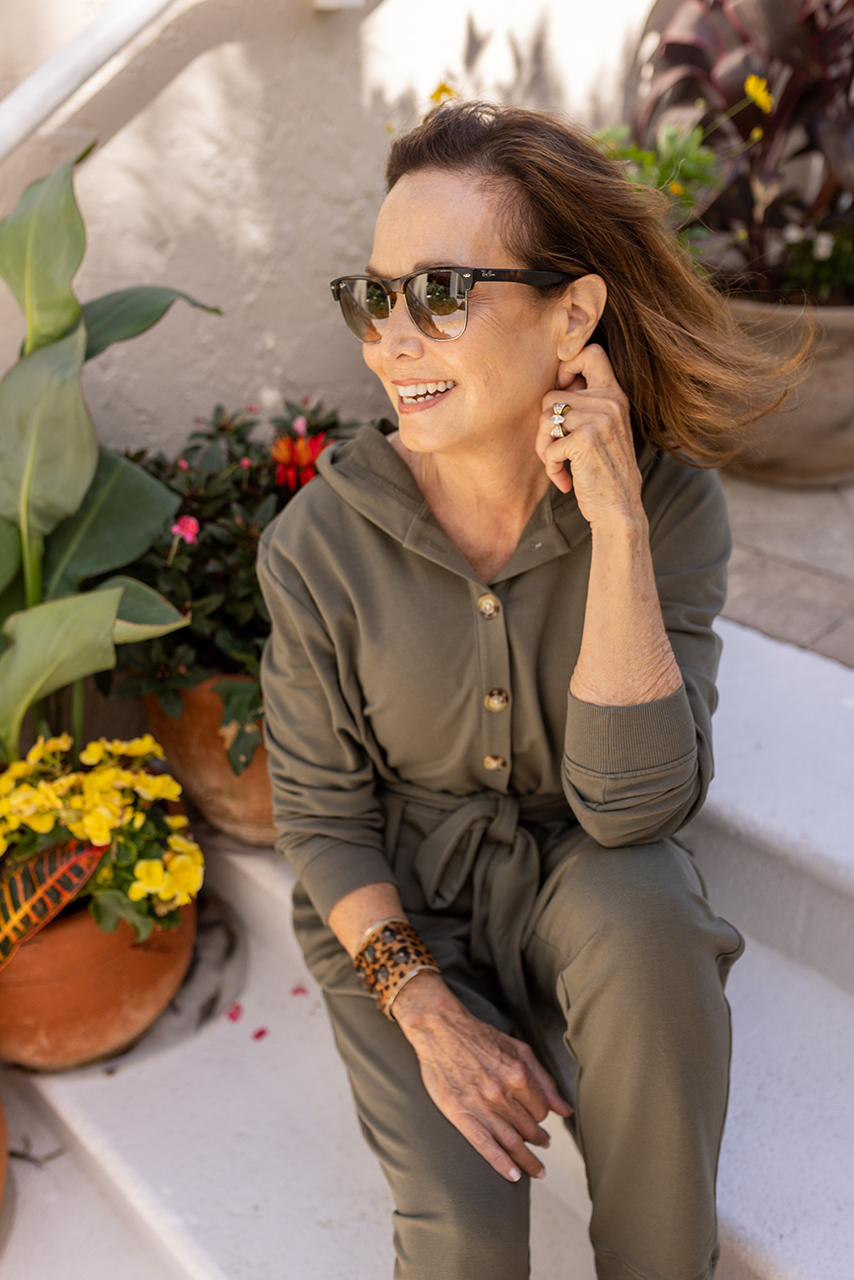 Nancy Weiss sitting on a step